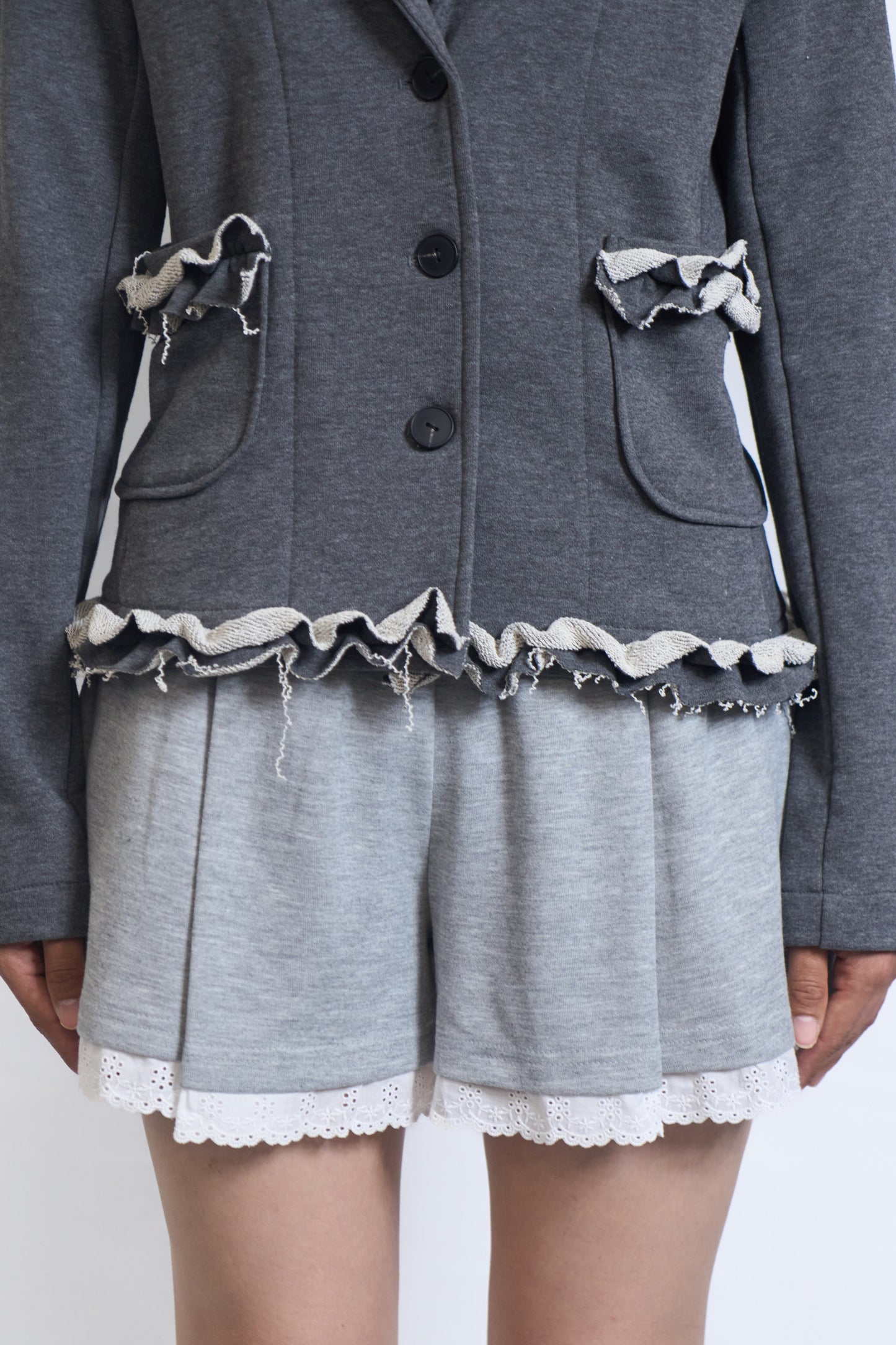 PLASTER JERSEY BLAZER WITH RAW RUFFLE TRIM