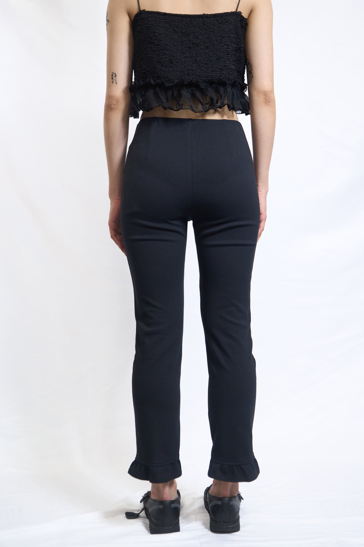 RUFFLE-HEM SLIM PANTS
