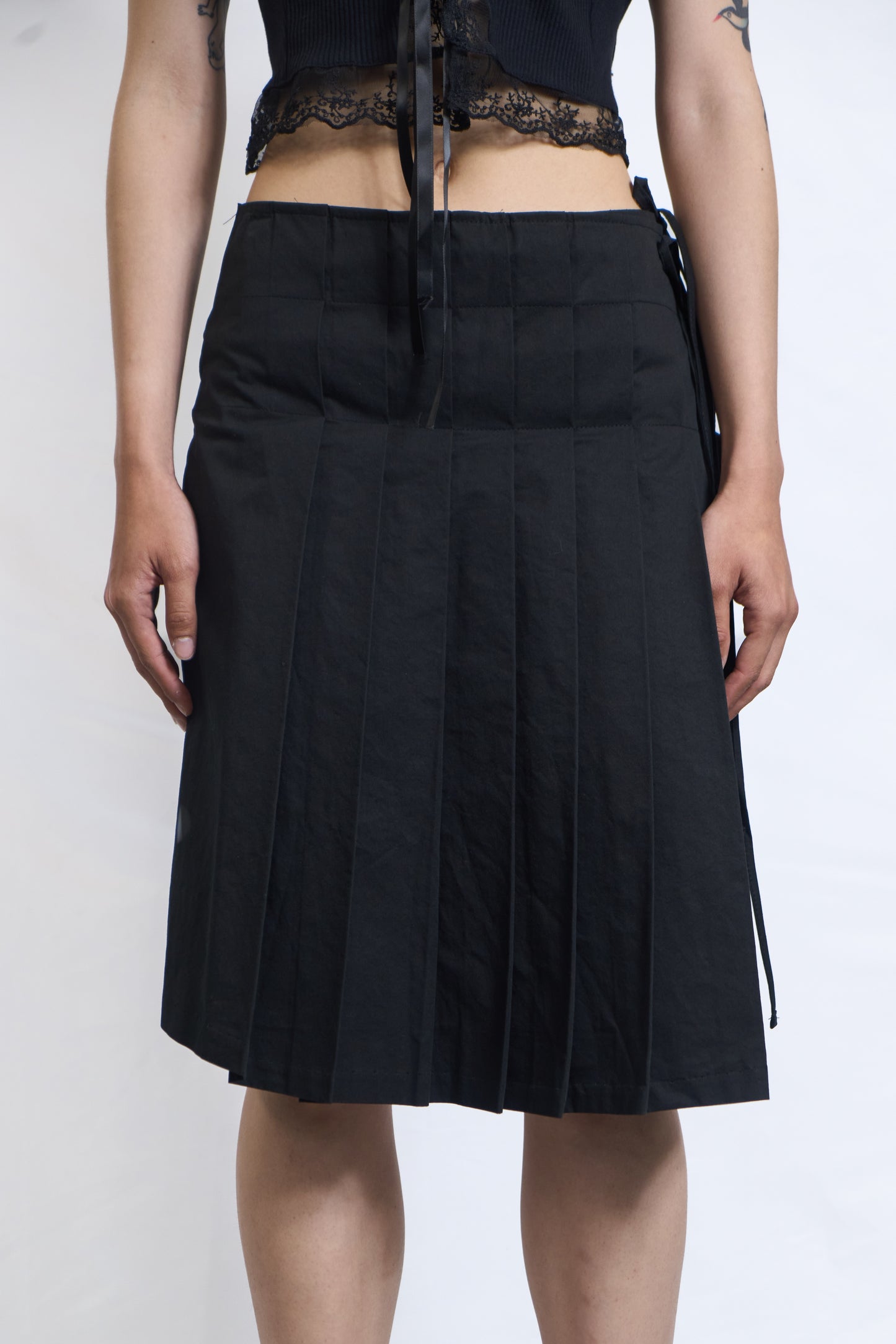 PLASTER PLEATED WRAP SKIRT