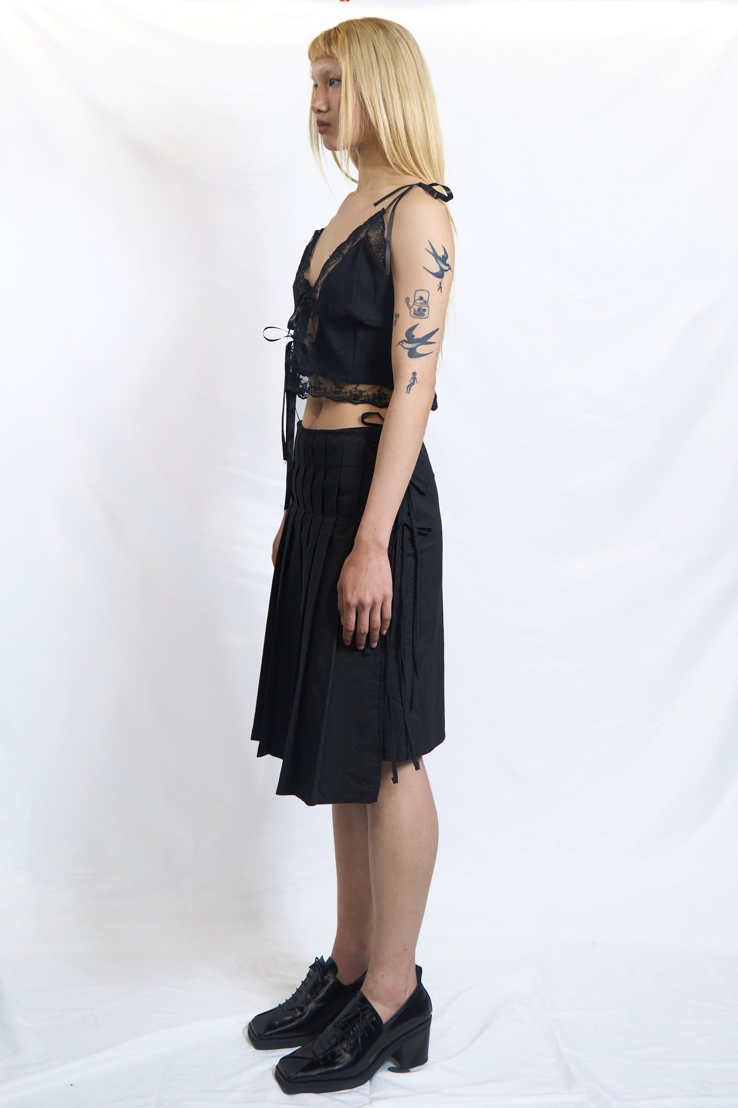 PLASTER PLEATED WRAP SKIRT