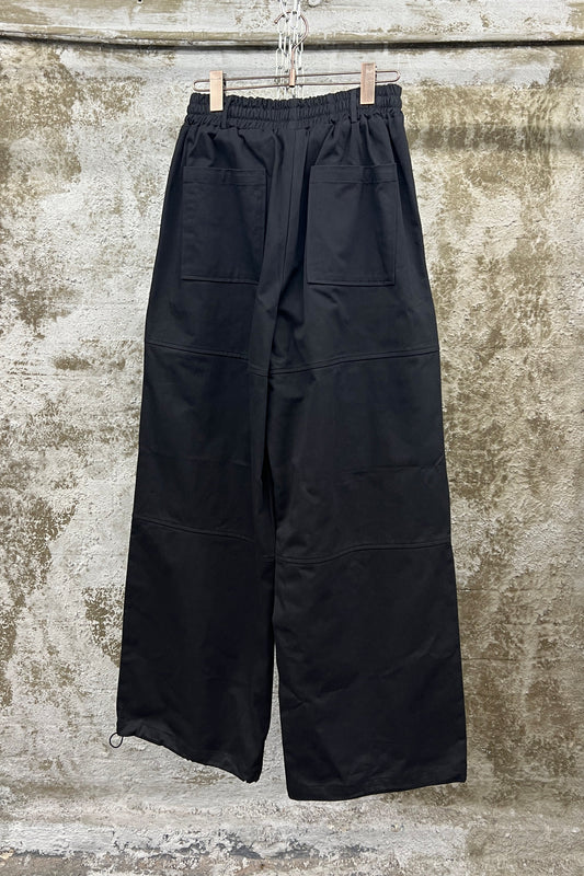 ASYMMETRIC POCKET WIDE-LEG TROUSERS