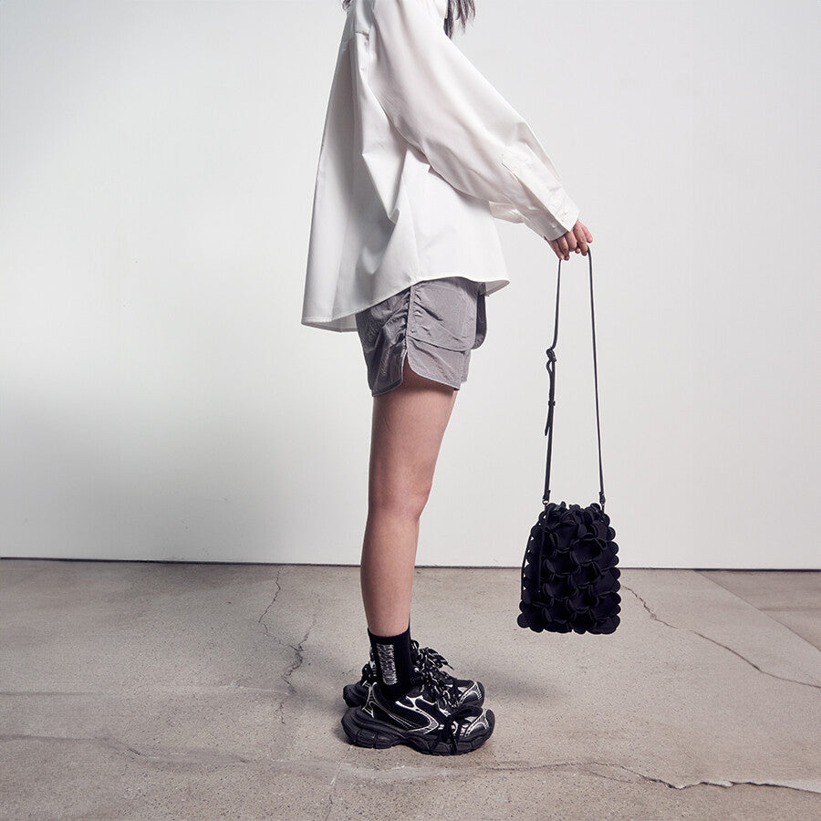PEOPLE OF THE WORLD NEOPRENE FLOWER BUCKET BAG