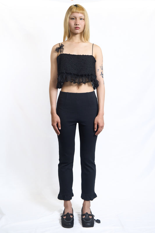 PLASTER RUFFLE-HEM SLIM PANTS