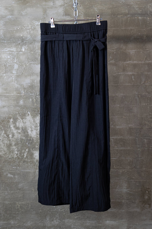 ASYMMETRIC BELTED WIDE-LEG TROUSERS — BLACK