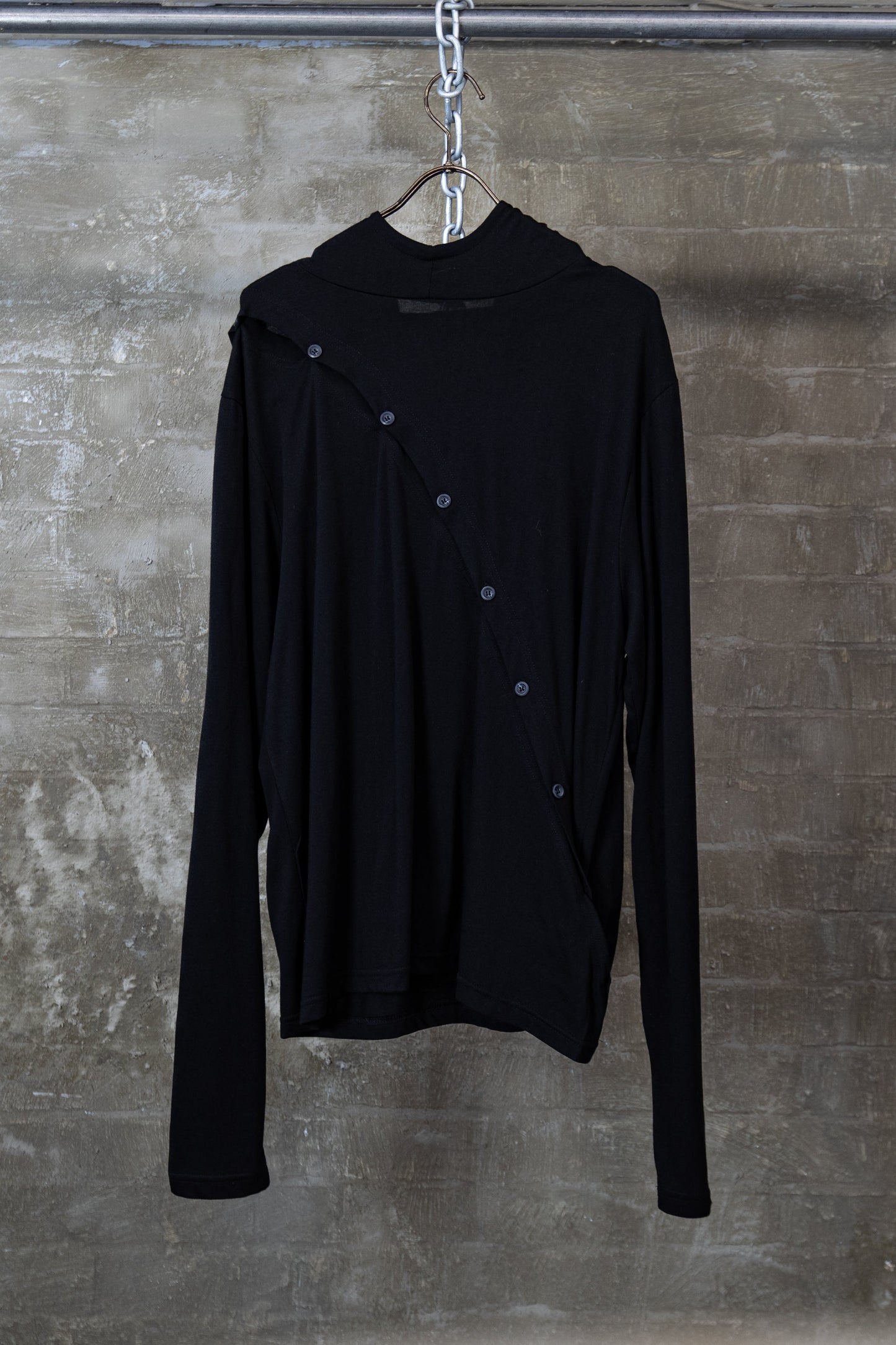 ASYMMETRIC BUTTON HOOD TOP — BLACK