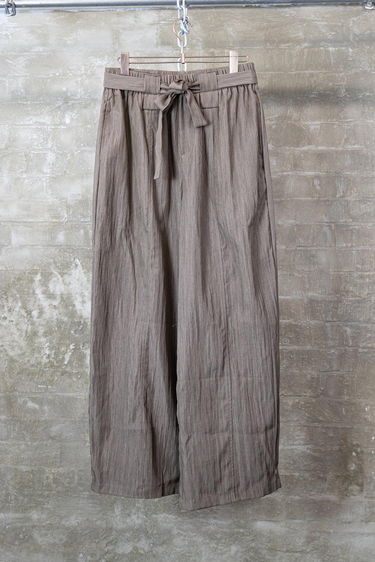 ASYMMETRIC BELTED WIDE-LEG TROUSERS — BROWN