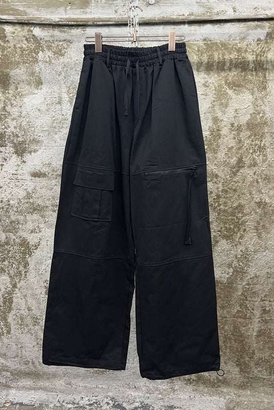 ASYMMETRIC POCKET WIDE-LEG TROUSERS