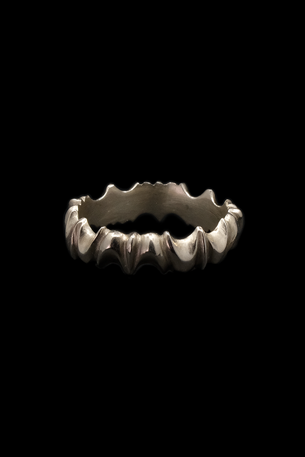 CUSPID RING