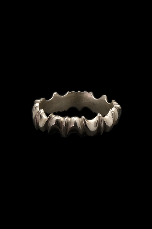 CUSPID RING
